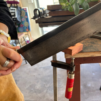 Using a small tenon or dovetail hand saw
